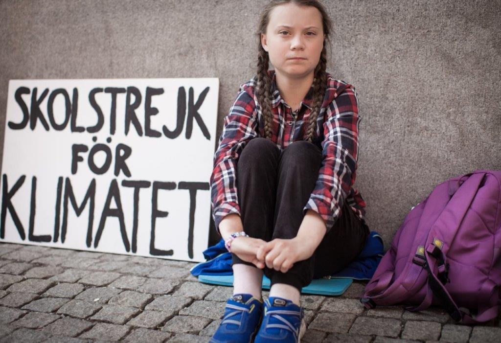Greta Thunberg outside the Swedish Parliament